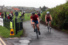 Start of the cycling during the Bamburgh Triathlon as the rain starts